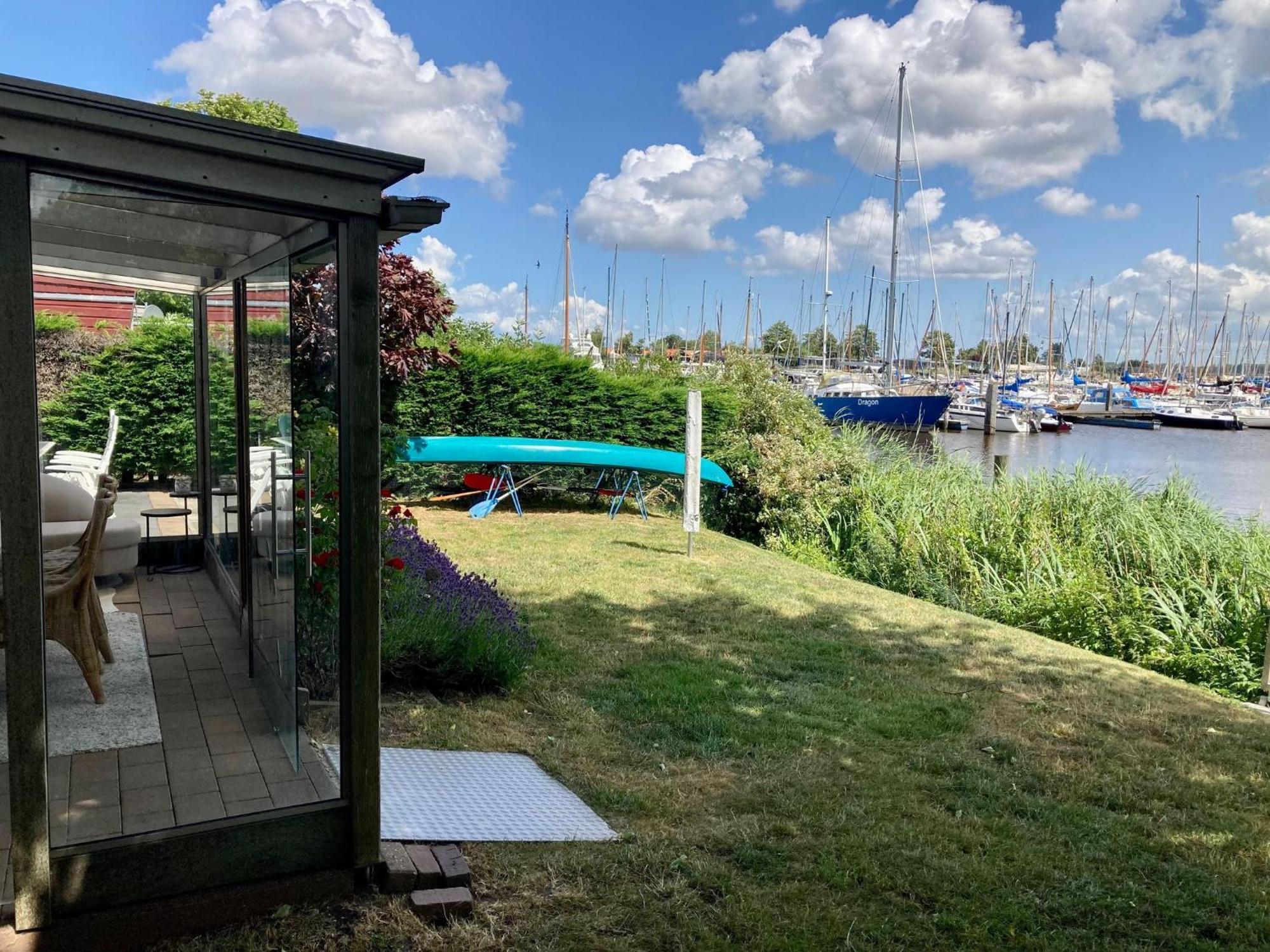 4 Pers Holiday Home Hilla With Winter Garden In Front Of The Dike Directly On The Lauwersmeer Anjum Esterno foto